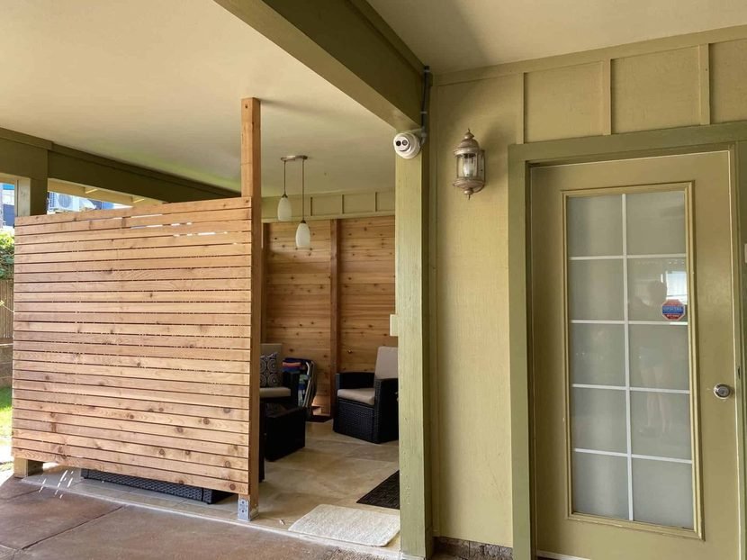 The bamboo privacy screen and the green French doors at the Sunrise entrance.